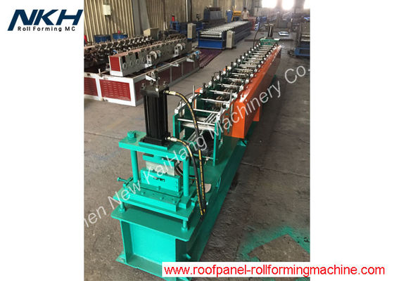 acheter Le métal de cadre de porte de feuille laminent à froid la formation faisant la machine avec la fonction de poinçon de trou, rails de porte de guide online manufacture